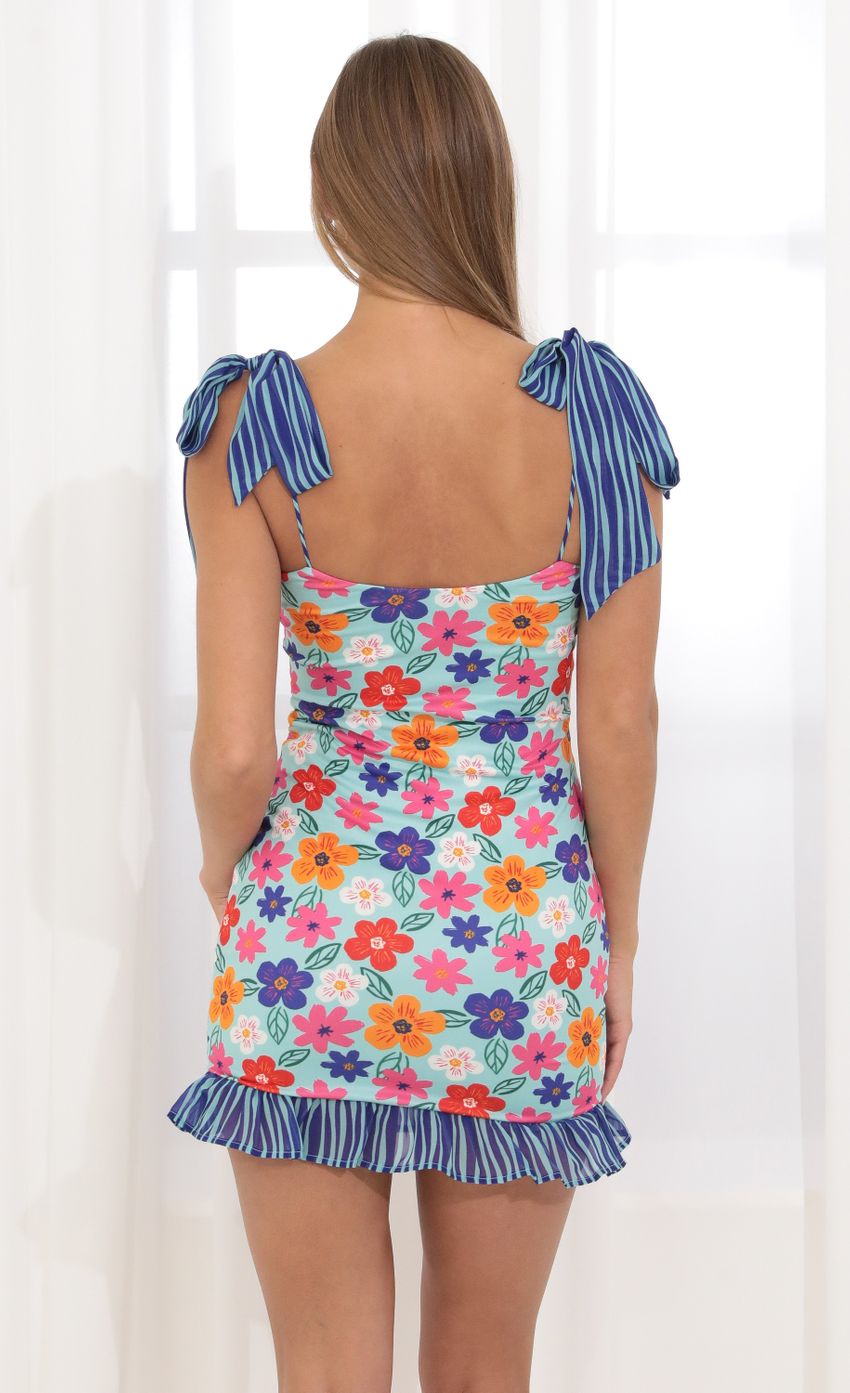 Picture Bodycon Dress in Blue Floral. Source: https://media-img.lucyinthesky.com/data/Apr22_2/850xAUTO/1V9A4194.JPG