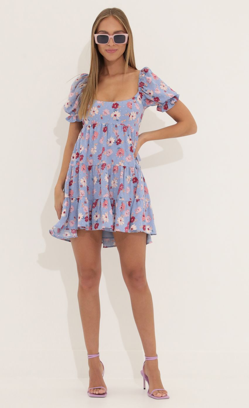Picture Fit and Flare Dress in Floral Purple. Source: https://media-img.lucyinthesky.com/data/Apr22_2/850xAUTO/1V9A4399.JPG