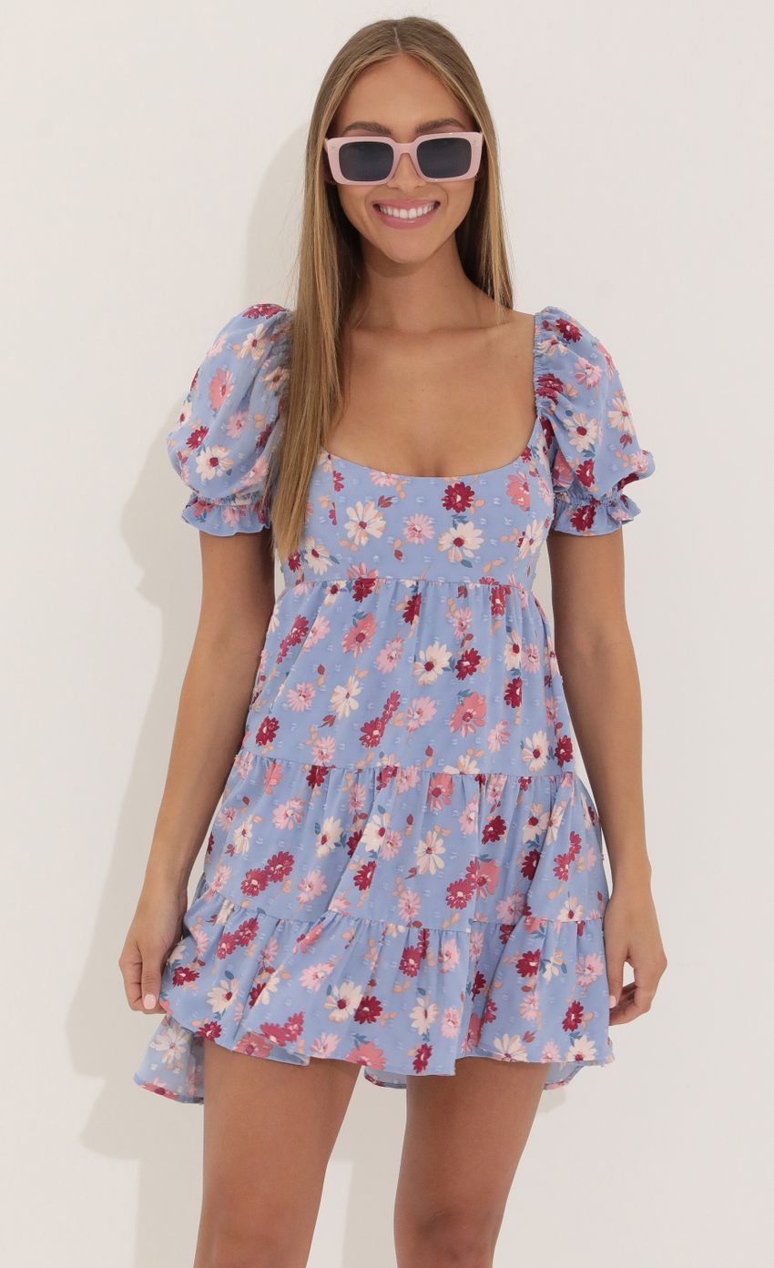 Picture Fit and Flare Dress in Floral Purple. Source: https://media-img.lucyinthesky.com/data/Apr22_2/850xAUTO/1V9A4436.JPG