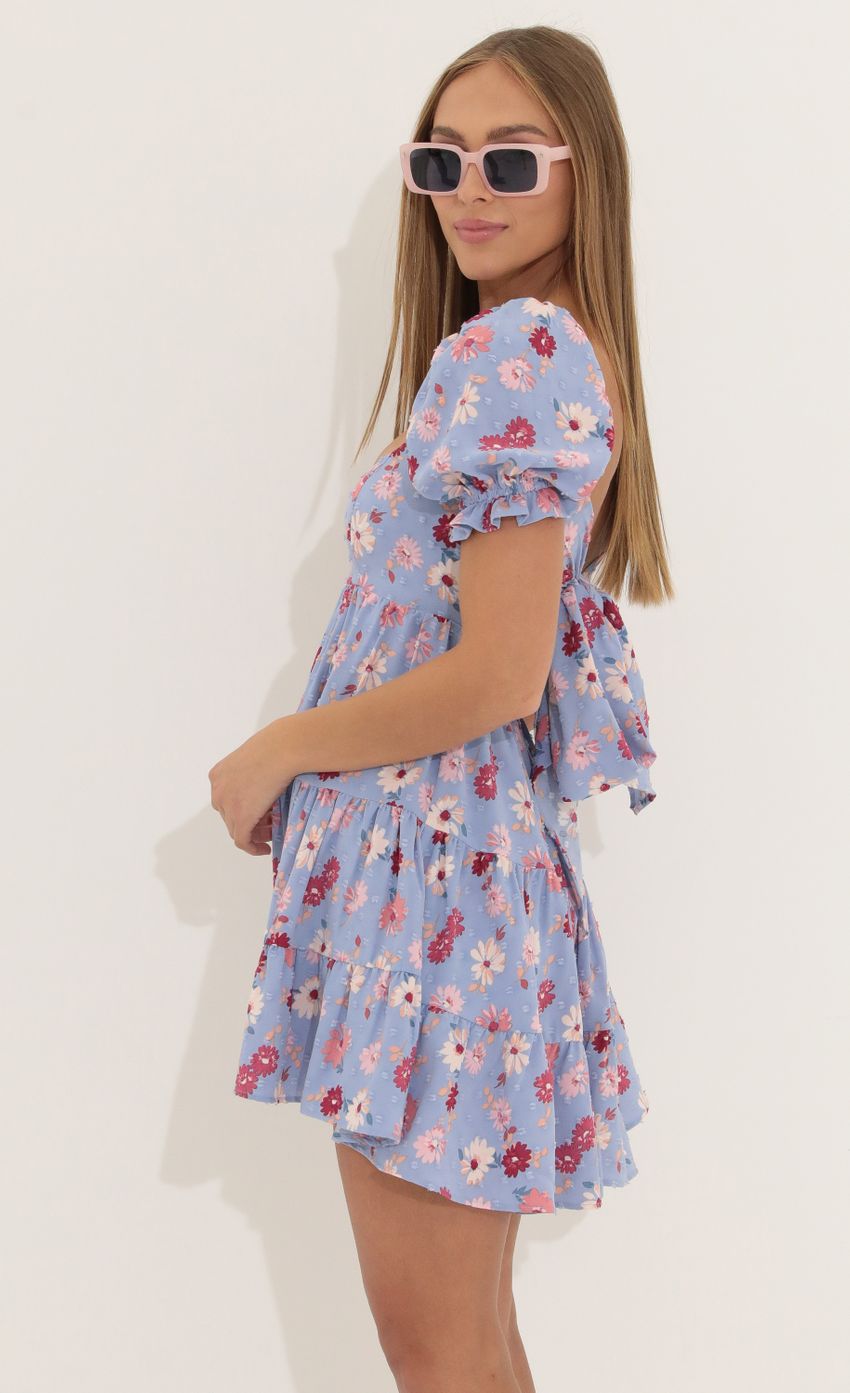 Picture Fit and Flare Dress in Floral Purple. Source: https://media-img.lucyinthesky.com/data/Apr22_2/850xAUTO/1V9A4449.JPG