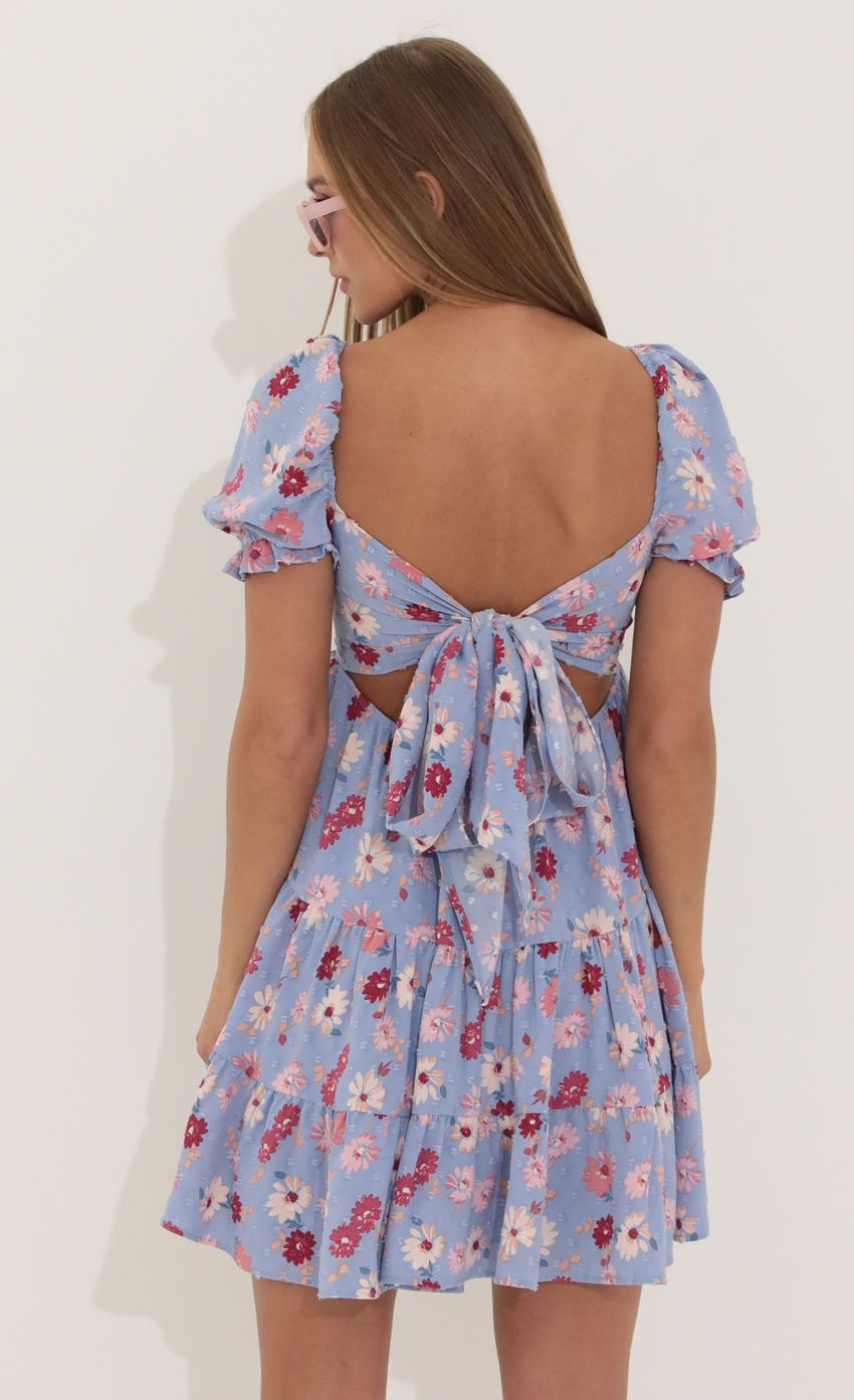 Picture Fit and Flare Dress in Floral Purple. Source: https://media-img.lucyinthesky.com/data/Apr22_2/850xAUTO/1V9A4500.JPG