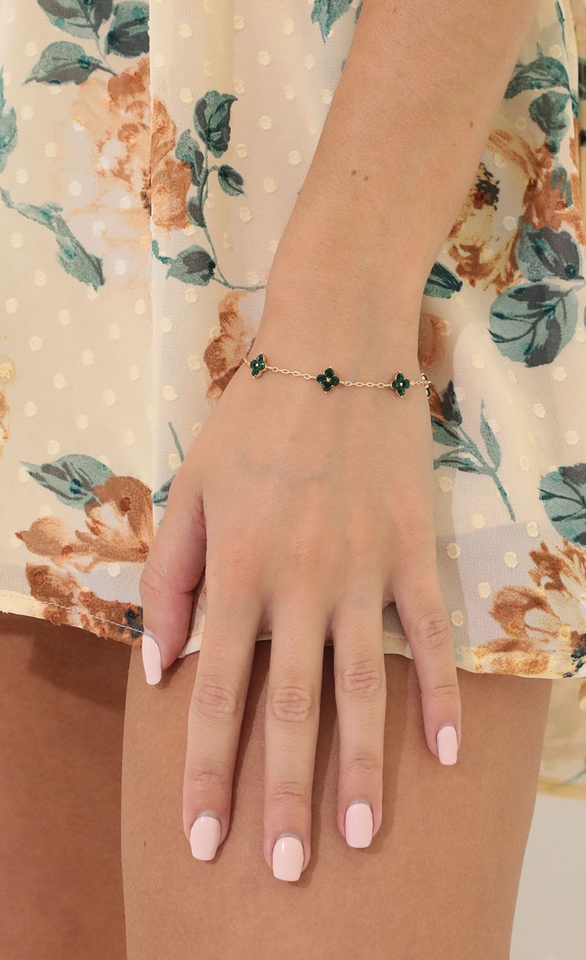 Picture Lucky Clover Bracelet in Emerald and Gold. Source: https://media-img.lucyinthesky.com/data/Apr22_2/850xAUTO/1V9A4902.JPG