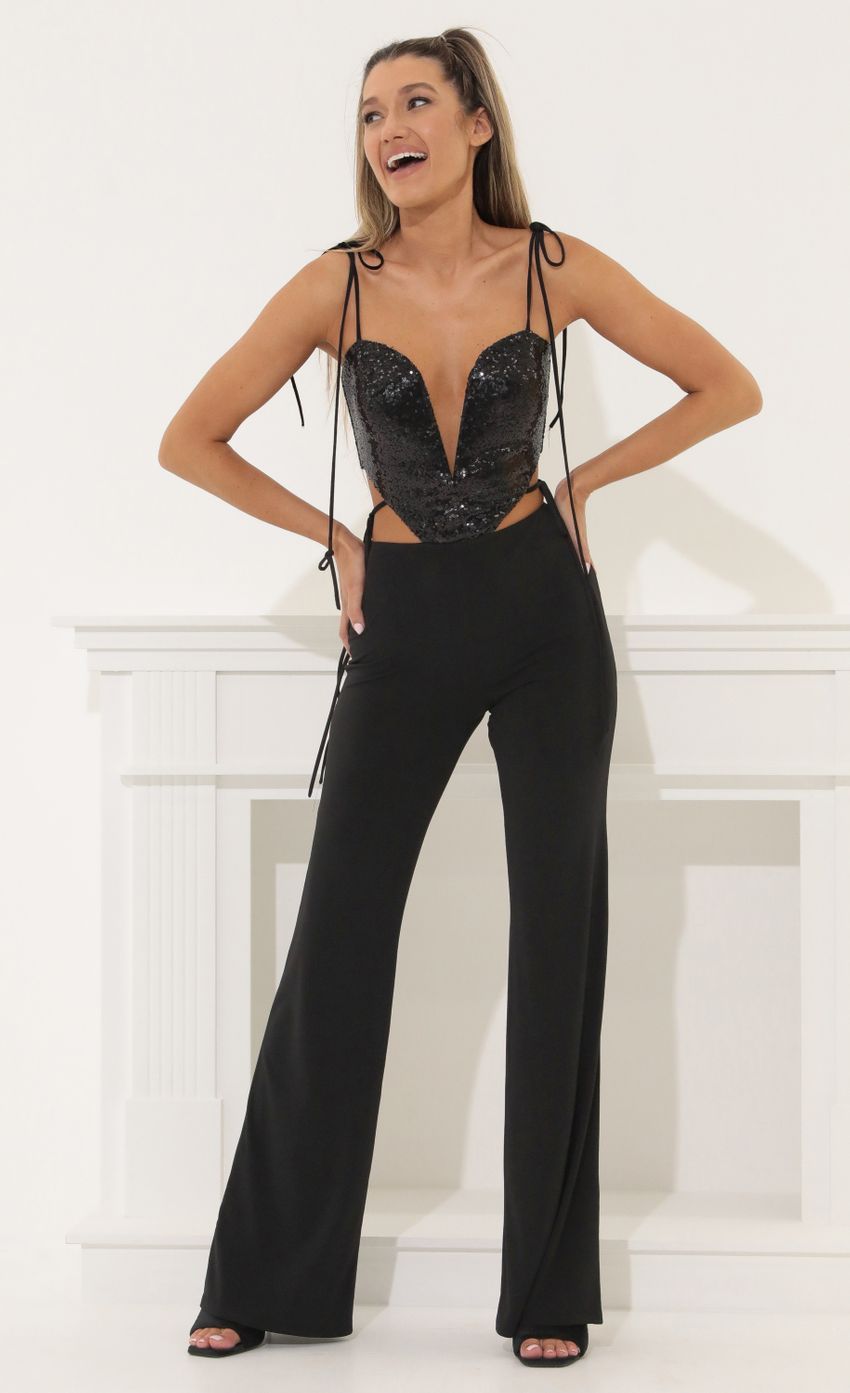 Picture Cutout Jumpsuit in Black. Source: https://media-img.lucyinthesky.com/data/Apr22_2/850xAUTO/1V9A57831.JPG
