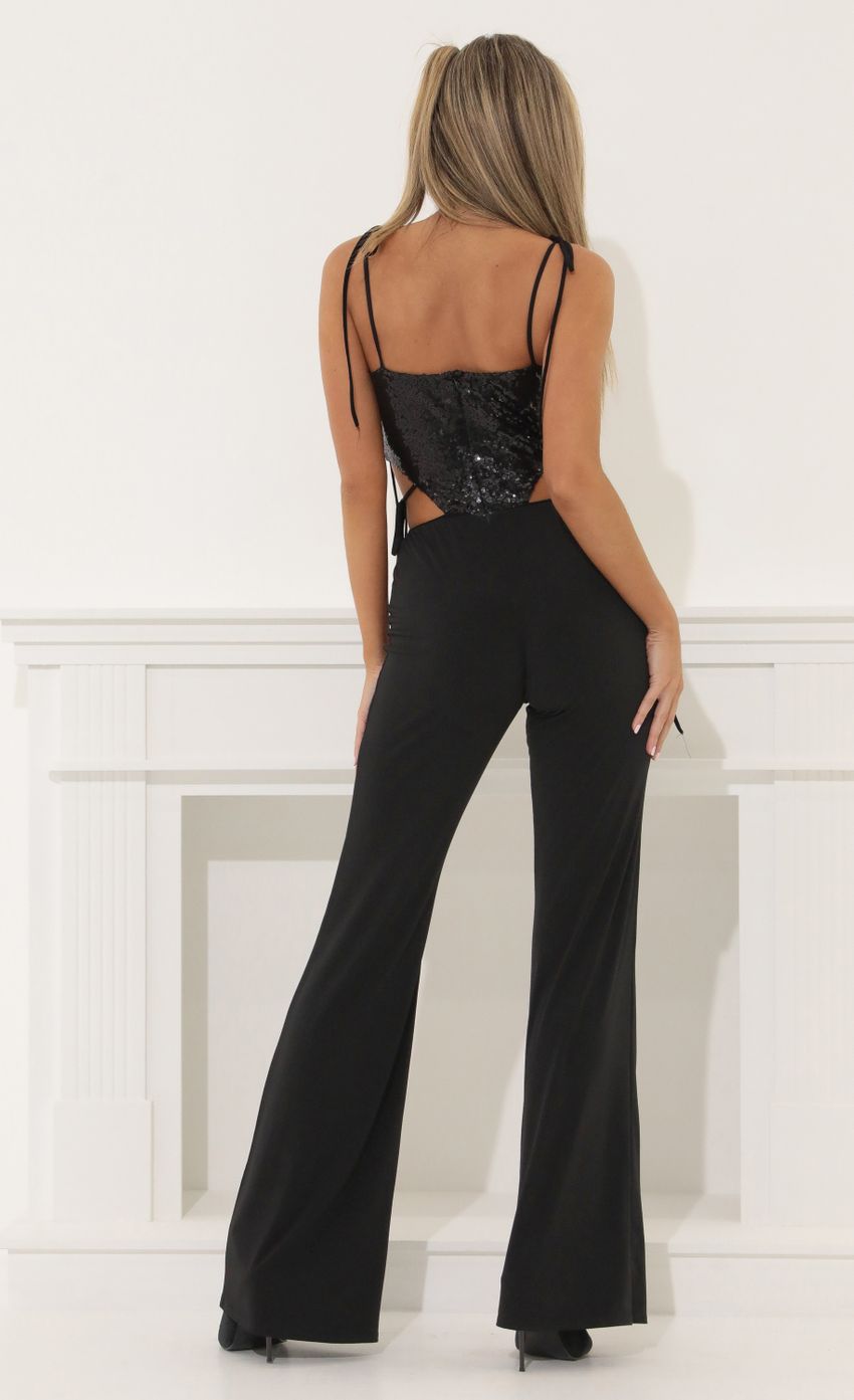 Picture Cutout Jumpsuit in Black. Source: https://media-img.lucyinthesky.com/data/Apr22_2/850xAUTO/1V9A5905.JPG