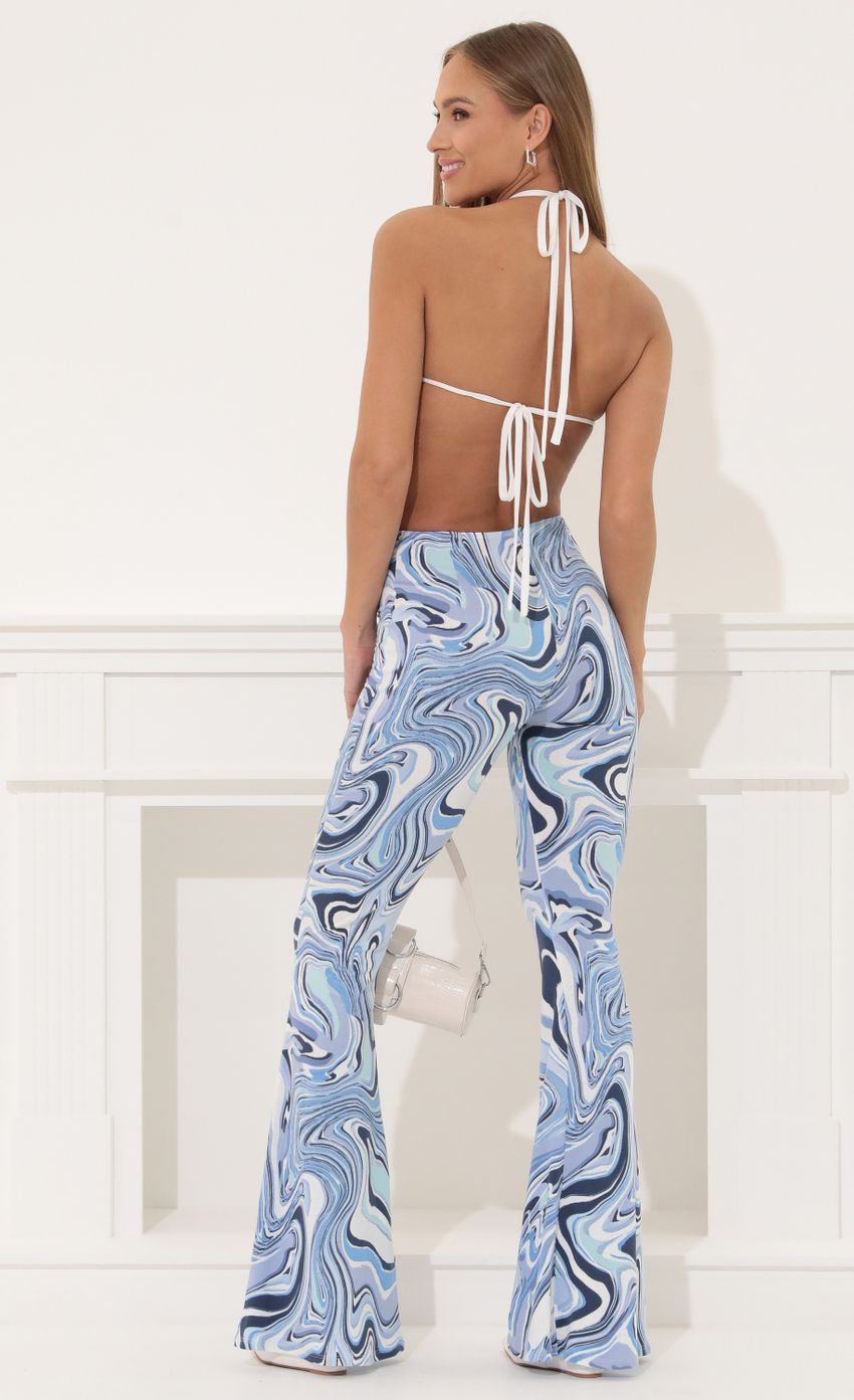 Picture Cecilia Halter Jumpsuit in Blue Swirl. Source: https://media-img.lucyinthesky.com/data/Apr22_2/850xAUTO/1V9A6531.JPG