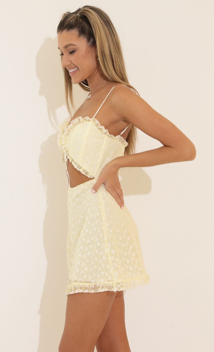 Picture Embroidered Cutout Dress in Yellow. Source: https://media-img.lucyinthesky.com/data/Apr22_2/850xAUTO/1V9A8329.JPG