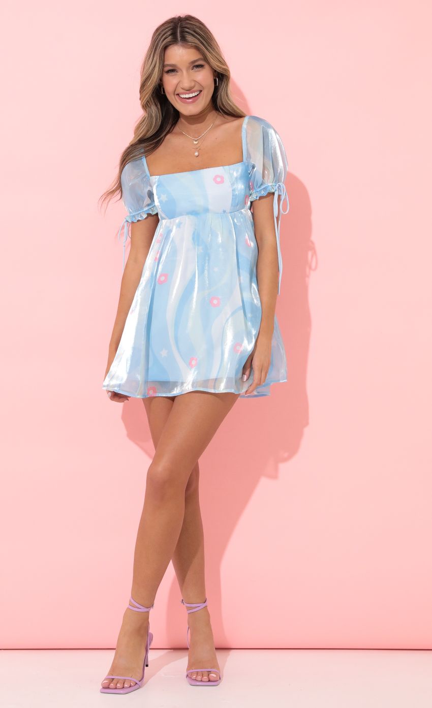 Picture Emerson Baby Doll Dress in Blue Floral Organza. Source: https://media-img.lucyinthesky.com/data/Apr22_2/850xAUTO/1V9A8416.JPG