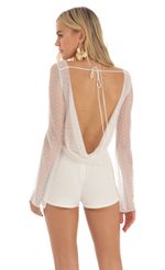 Picture Mesh Dotted Open Back Romper in White. Source: https://media-img.lucyinthesky.com/data/Apr23/150xAUTO/94dfaf04-367c-4d41-b300-64e9171ec2d8.jpg