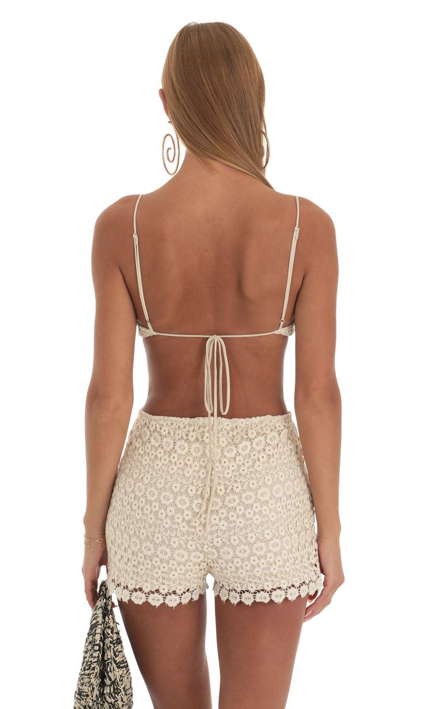 Picture Crochet Romper in Beige. Source: https://media-img.lucyinthesky.com/data/Apr23/850xAUTO/052c9fe0-a2dd-45a6-8575-a028c935975d.jpg