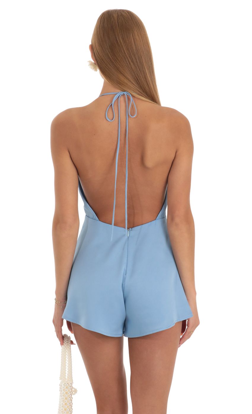 Picture Plunge V- Neck Romper in Blue. Source: https://media-img.lucyinthesky.com/data/Apr23/850xAUTO/249792c0-1738-4ae1-b9ce-df9eecb27c3f.jpg