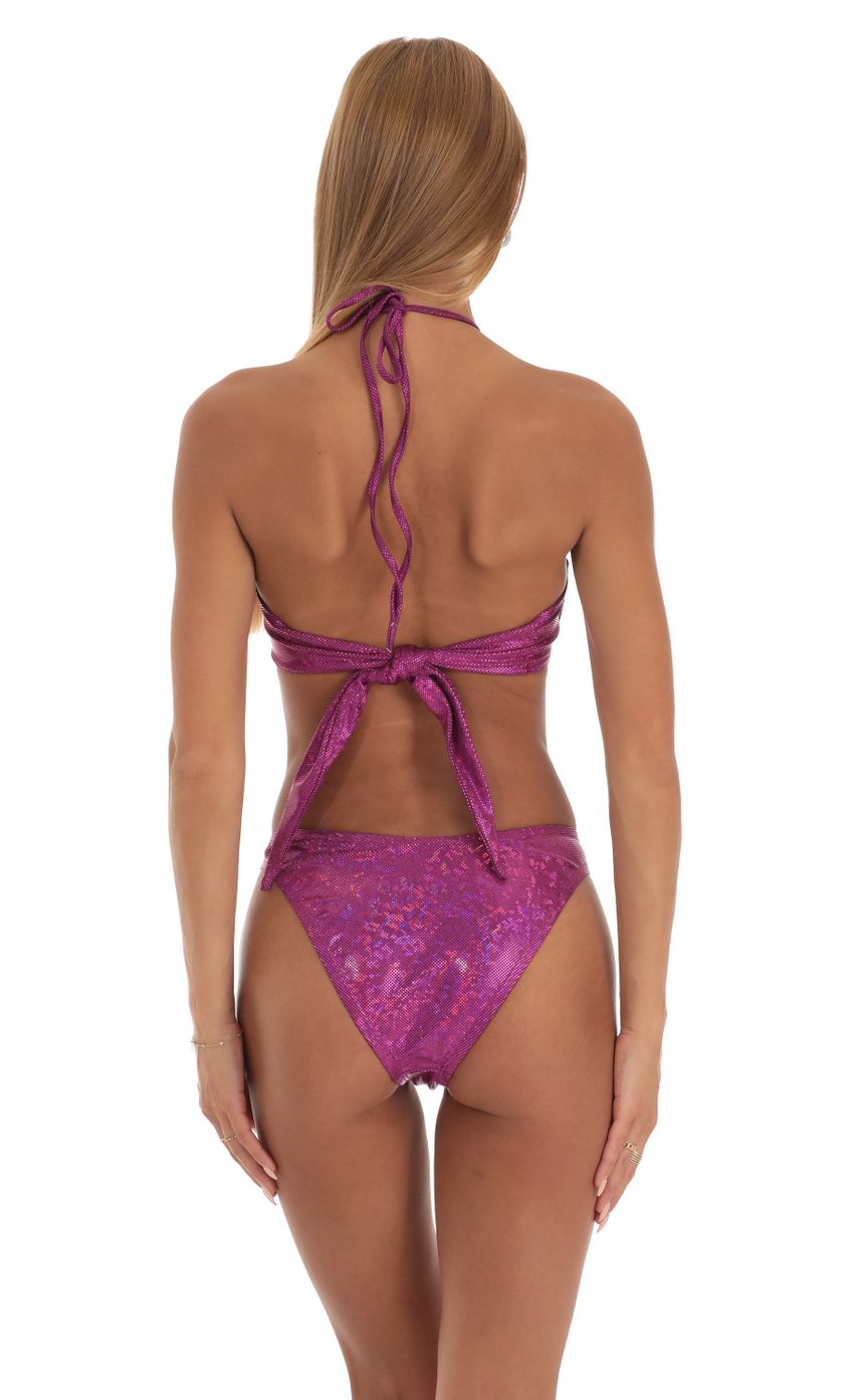 Picture Carmella Holographic Halter Bikini Set in Magenta. Source: https://media-img.lucyinthesky.com/data/Apr23/850xAUTO/260f2314-4864-4033-b901-f0a76e652661.jpg