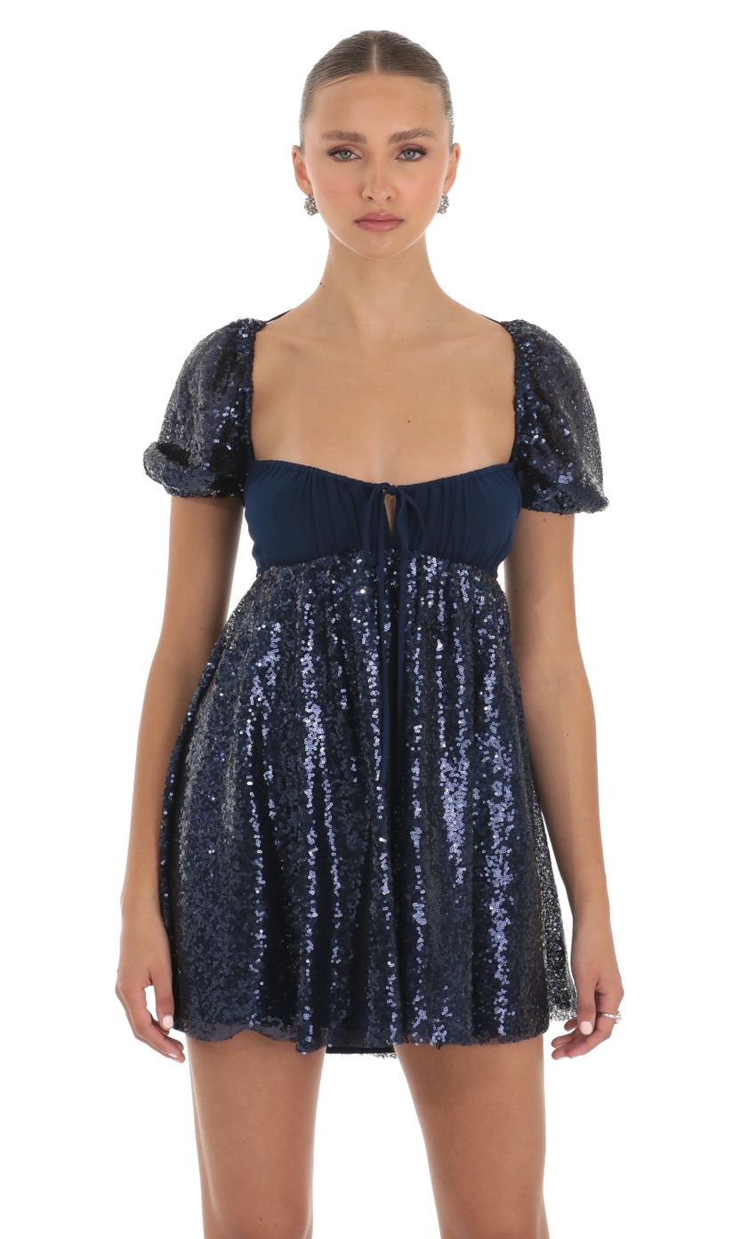 Picture Sequin Puff Sleeve Baby Doll Dress in Navy. Source: https://media-img.lucyinthesky.com/data/Apr23/850xAUTO/64c0832d-13d8-4819-abf0-bc8fb8780f9e.jpg