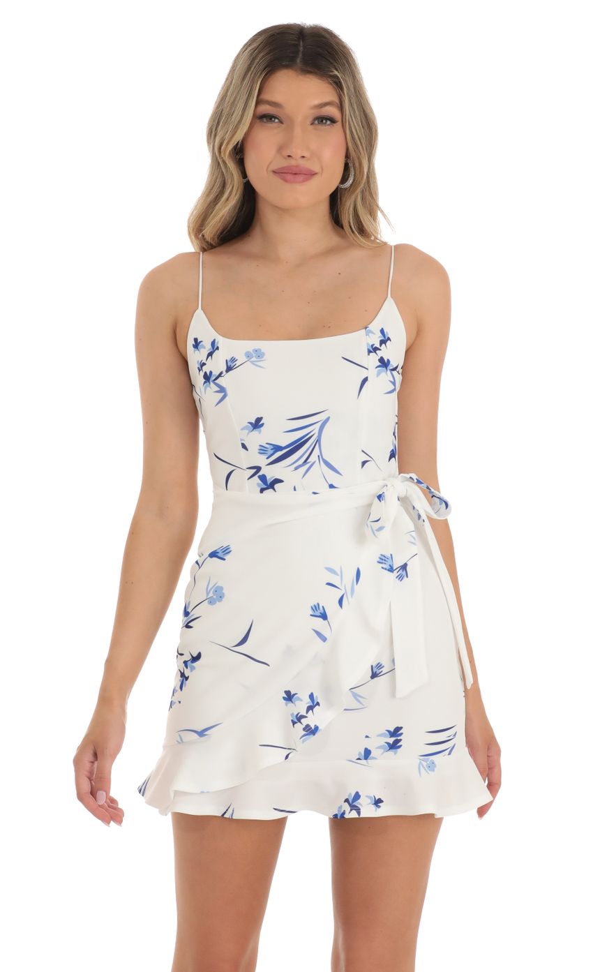 Picture Ruffle Tie Dress in White Floral. Source: https://media-img.lucyinthesky.com/data/Apr23/850xAUTO/79f8ec86-a8cc-4de7-87a8-077cdb59258c.jpg