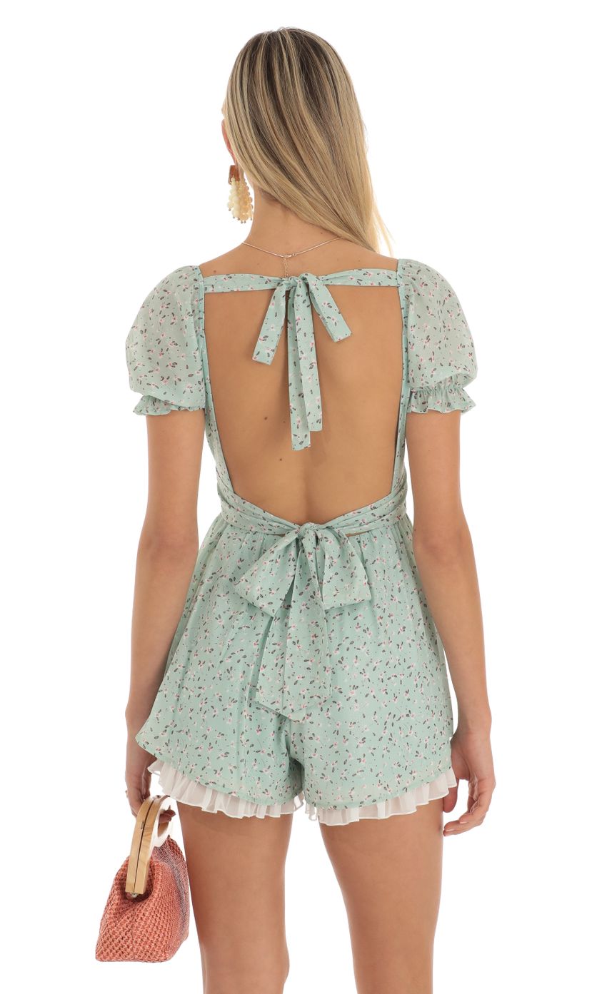 Picture Floral Foiled Romper in Green. Source: https://media-img.lucyinthesky.com/data/Apr23/850xAUTO/7df48f96-b98a-46ea-b996-ac2b7b8f8219.jpg