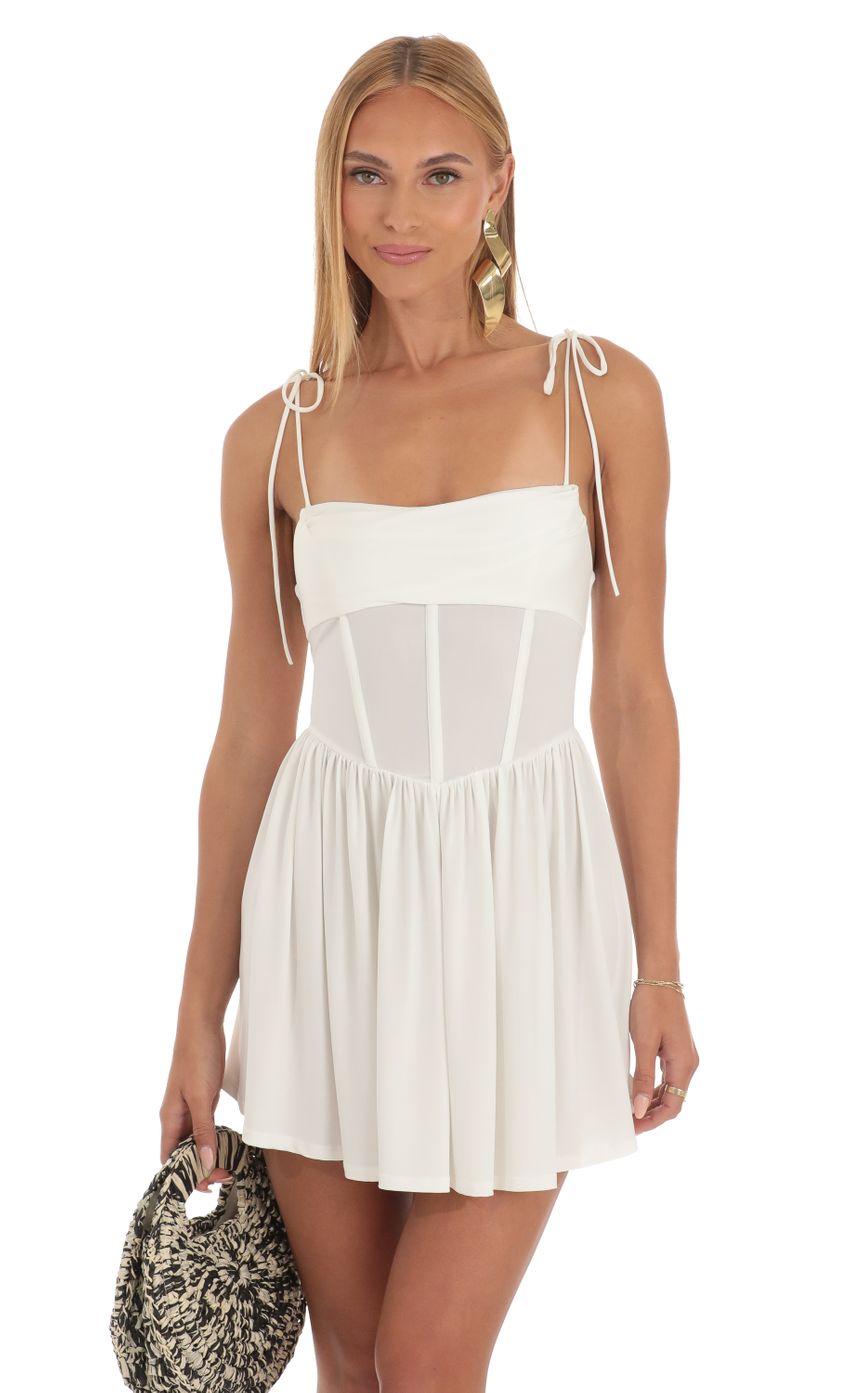 Picture Draped Corset Dress in White. Source: https://media-img.lucyinthesky.com/data/Apr23/850xAUTO/8666874d-baf7-4d54-ac87-a808d237bce4.jpg