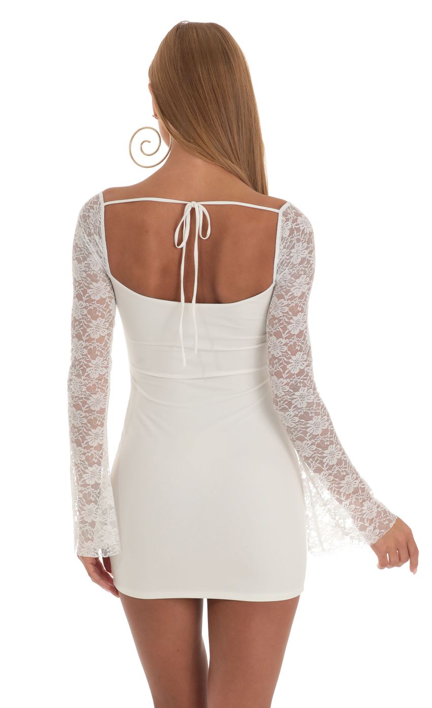 Picture Lace Long Sleeve Dress in White. Source: https://media-img.lucyinthesky.com/data/Apr23/850xAUTO/8be03b6b-6baf-4d7c-9e4a-61025c904a6a.jpg