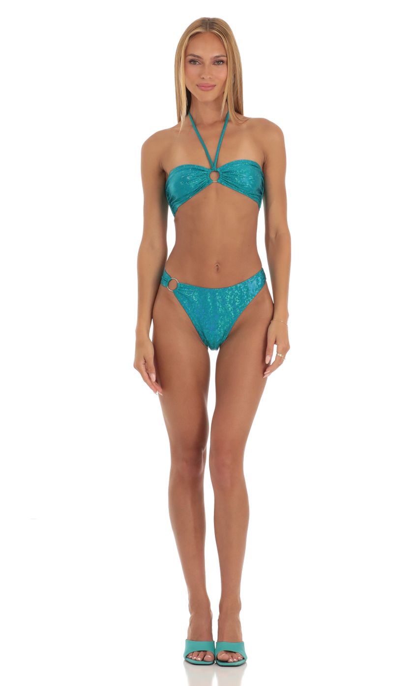 Picture Carmella Holographic Halter Bikini Set in Teal. Source: https://media-img.lucyinthesky.com/data/Apr23/850xAUTO/98ca08c6-be32-47be-b830-f26d3d386a8f.jpg