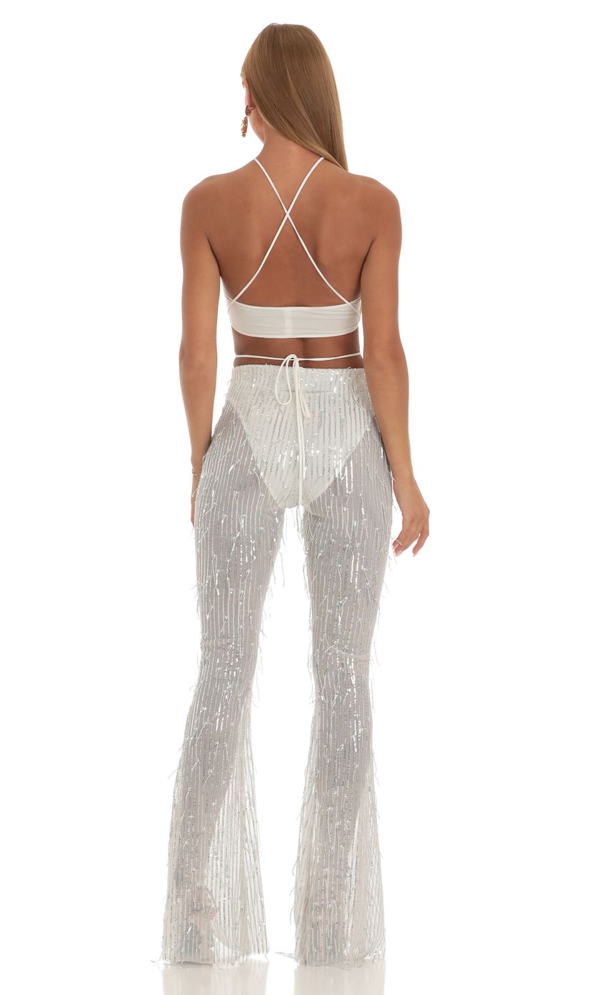 Picture Fringe Sequin Three Piece Set in White. Source: https://media-img.lucyinthesky.com/data/Apr23/850xAUTO/bc6cc9f7-ddc0-4848-9d1f-77d78a961a3a.jpg