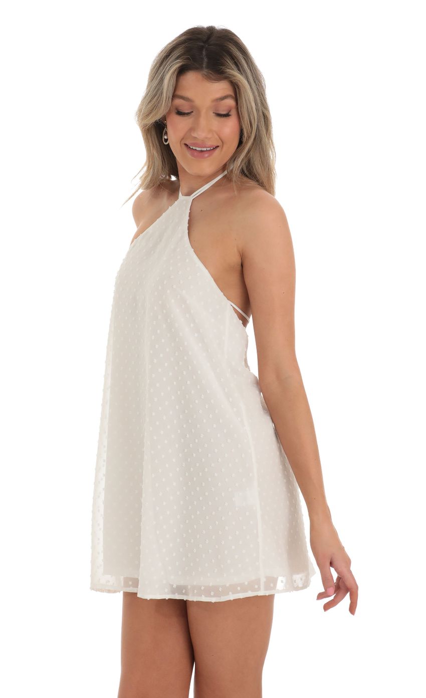 Picture Maya Dotted Chiffon Halter Dress in White. Source: https://media-img.lucyinthesky.com/data/Apr23/850xAUTO/c0f87fe8-822c-4d3c-a311-d0dda375db0d.jpg