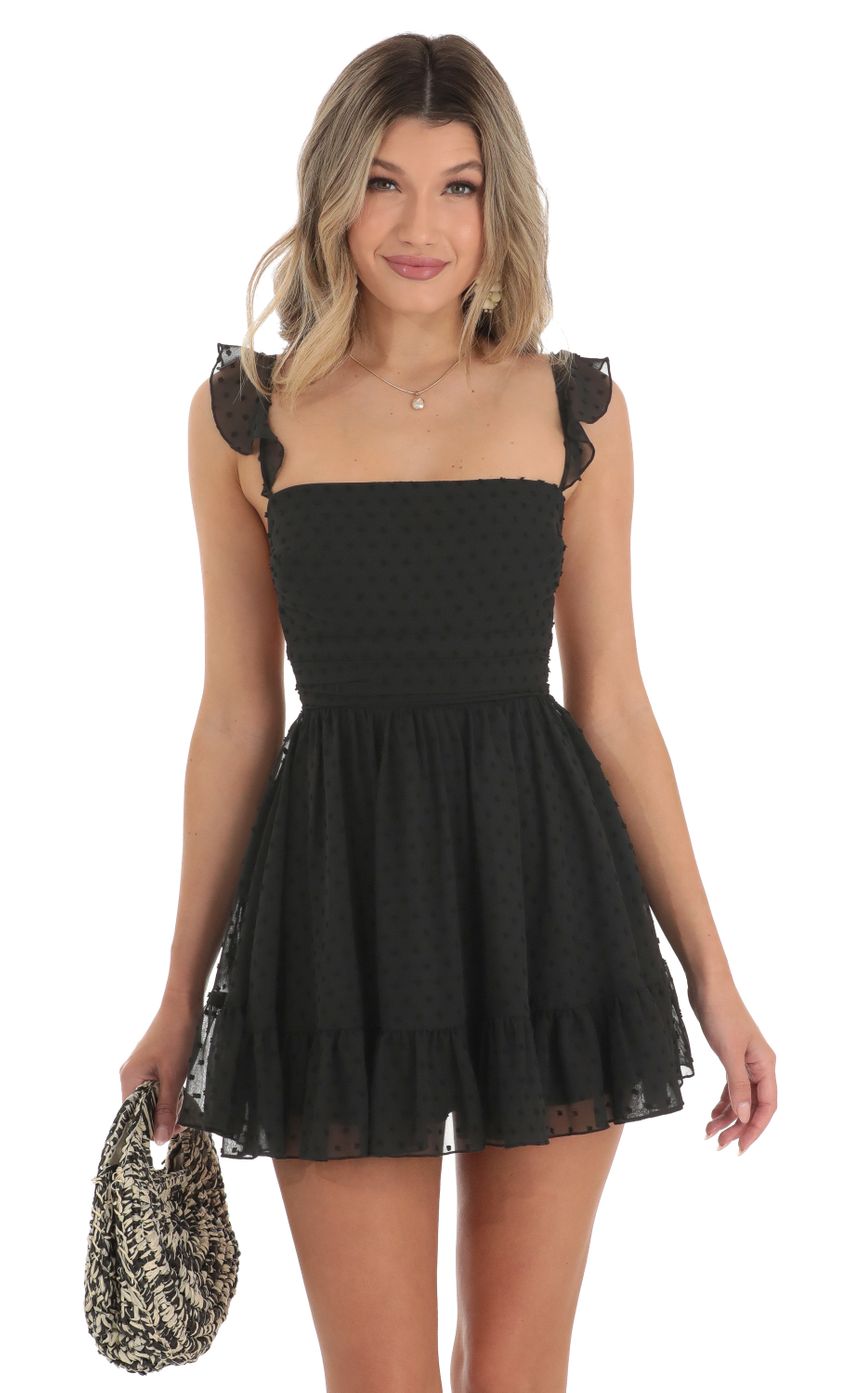 Picture Dotted Fit and Flare Dress in Black. Source: https://media-img.lucyinthesky.com/data/Apr23/850xAUTO/de2347c6-b738-40a5-80d9-45f08daa45f7.jpg