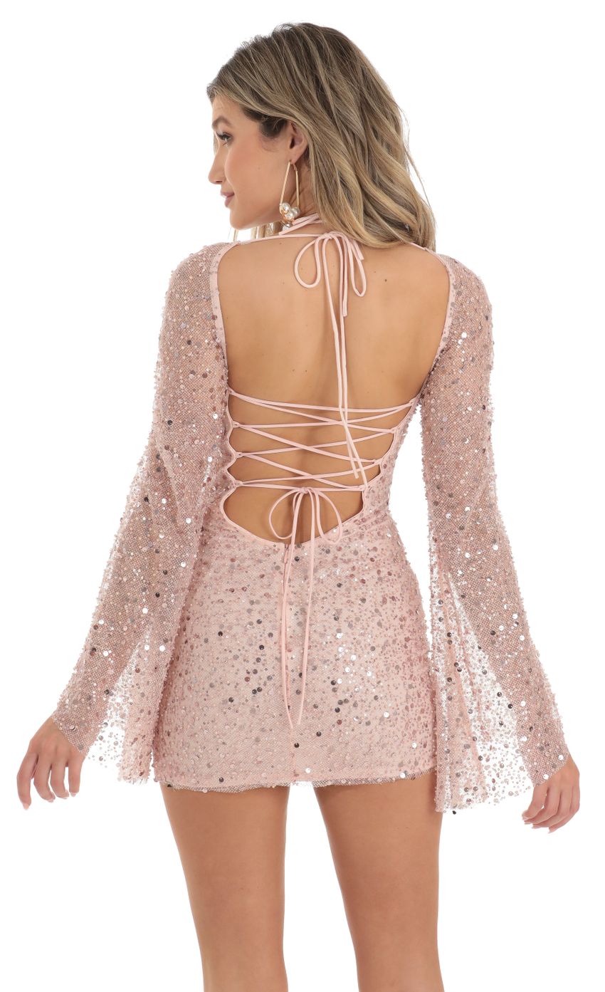Picture Sequin Bell Sleeve Dress in Pink. Source: https://media-img.lucyinthesky.com/data/Apr23/850xAUTO/fbf3bec4-77ef-4988-bd38-a466e62b111f.jpg
