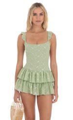 Picture Floral Embroidered Romper in Green. Source: https://media-img.lucyinthesky.com/data/Apr24/150xAUTO/1f073275-7618-4131-b1d0-3de042e8e250.jpg