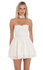 Picture Shimmer Fit and Flare Dress in White. Source: https://media-img.lucyinthesky.com/data/Apr24/150xAUTO/24b5acc5-d797-4a13-96ae-a69a562b7ed5.jpg