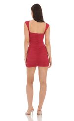 Picture High Neck Open Back Dress in Red. Source: https://media-img.lucyinthesky.com/data/Apr24/150xAUTO/34bfbd92-3bcb-4e1c-a362-240a1f219331.jpg