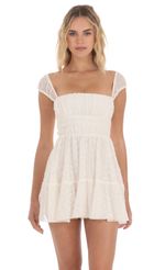 Picture Chiffon Eyelet Cap Sleeve Dress in Cream. Source: https://media-img.lucyinthesky.com/data/Apr24/150xAUTO/7cc5a580-05d0-4a27-ad7c-b7eaf4d07910.jpg