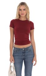 Picture Stretch Short Sleeve Top in Maroon. Source: https://media-img.lucyinthesky.com/data/Apr24/150xAUTO/a0862378-89f0-41cd-b421-7bb9e1205487.jpg
