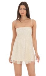 Picture Baby Doll Dress in White Sequin. Source: https://media-img.lucyinthesky.com/data/Apr24/150xAUTO/a953092c-eb37-4b39-8257-1421afad67bb.jpg