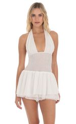 Picture Dotted Halter Smocked Romper in White. Source: https://media-img.lucyinthesky.com/data/Apr24/150xAUTO/d9bfbc36-4166-4147-9491-8ac79d82f712.jpg