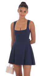 Picture Back Bow A-Line Dress in Navy. Source: https://media-img.lucyinthesky.com/data/Apr24/150xAUTO/e0734d0c-7af9-4817-8ad6-f768e9731165.jpg