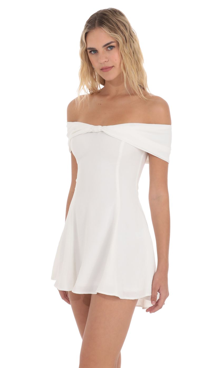 Picture Front Bow Off Shoulder Dress in White. Source: https://media-img.lucyinthesky.com/data/Apr24/850xAUTO/05b1e901-957f-486d-b689-333a85987f2e.jpg