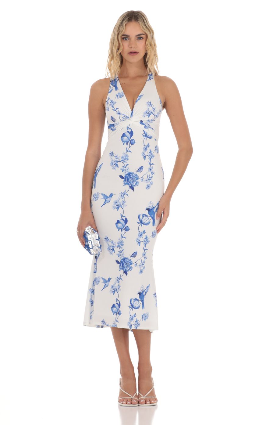 Picture Floral Front Twist Midi Dress in White. Source: https://media-img.lucyinthesky.com/data/Apr24/850xAUTO/06a417ba-de03-447c-ba81-0b5df9d0cdda.jpg