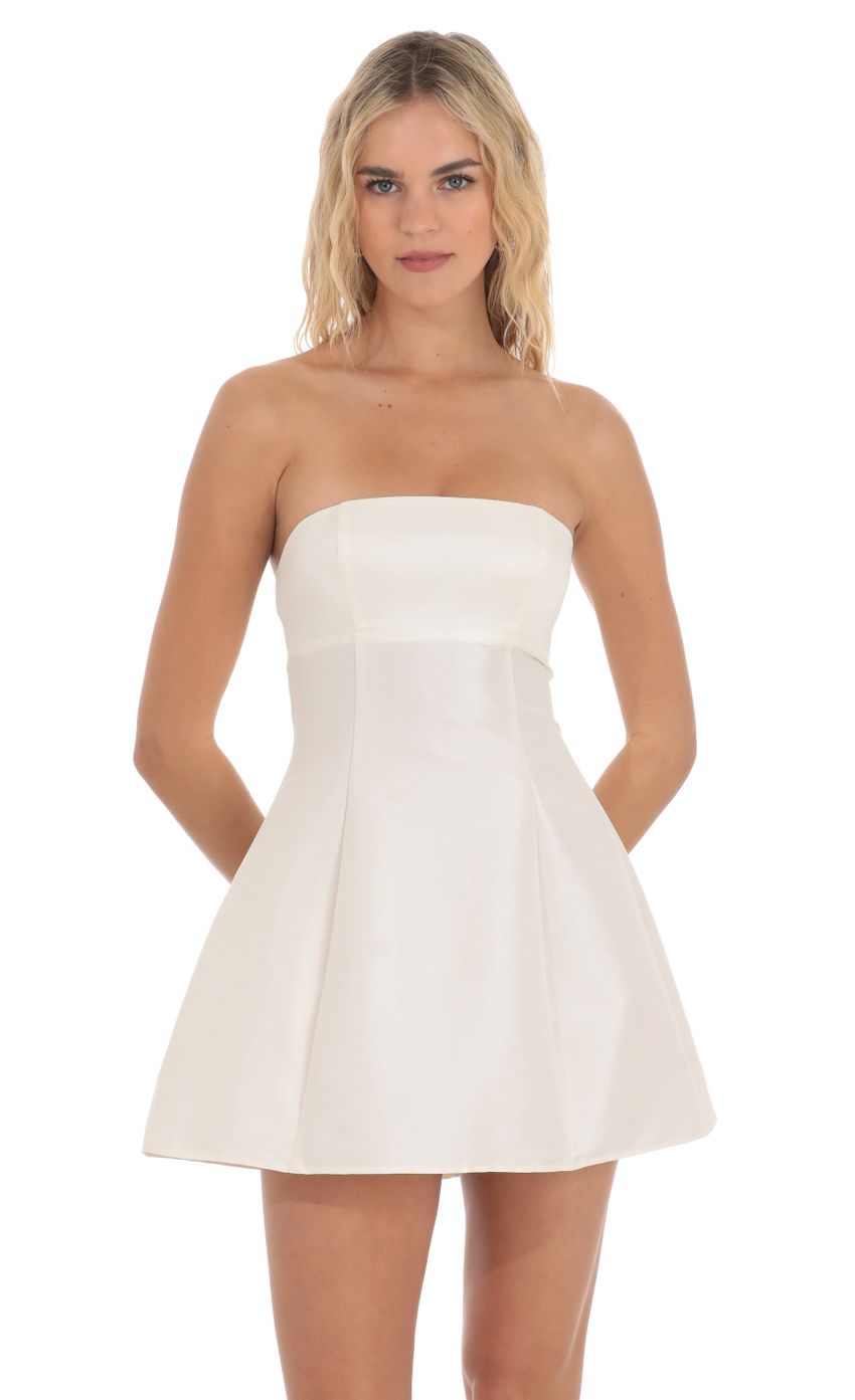 Picture Strapless Flare Dress in Ivory. Source: https://media-img.lucyinthesky.com/data/Apr24/850xAUTO/131f05b4-5b59-47dc-876e-638ba5aa2617.jpg