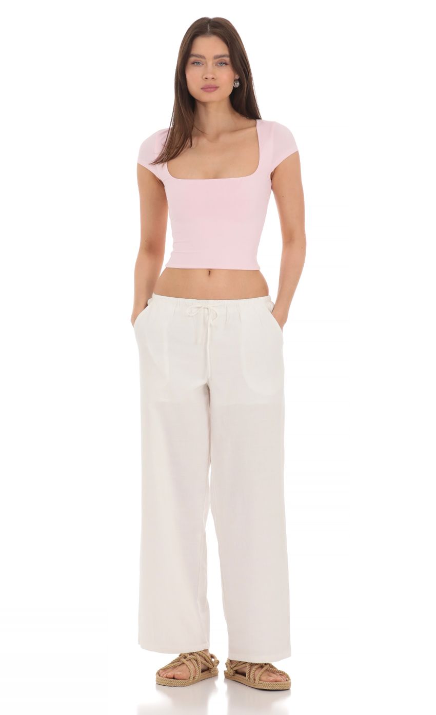 Picture Drawstring Wide Leg Pants in White. Source: https://media-img.lucyinthesky.com/data/Apr24/850xAUTO/1a23673a-457d-449d-9c25-32965b9a6ce5.jpg