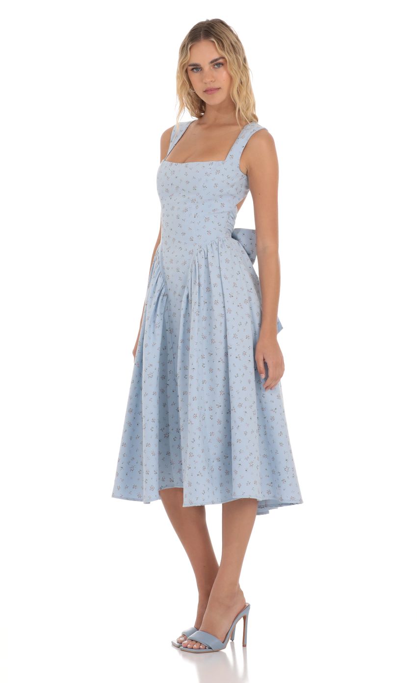 Picture Floral Open Back Midi Dress in Blue. Source: https://media-img.lucyinthesky.com/data/Apr24/850xAUTO/23e95a13-8b36-4148-9db5-09918582b1d6.jpg