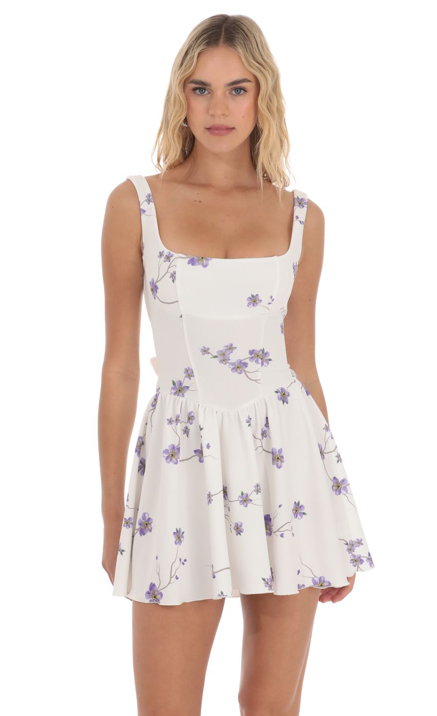 Picture Floral Open Back Flare Dress in White. Source: https://media-img.lucyinthesky.com/data/Apr24/850xAUTO/23f7e502-8aec-4adb-bff5-659fac2188e4.jpg