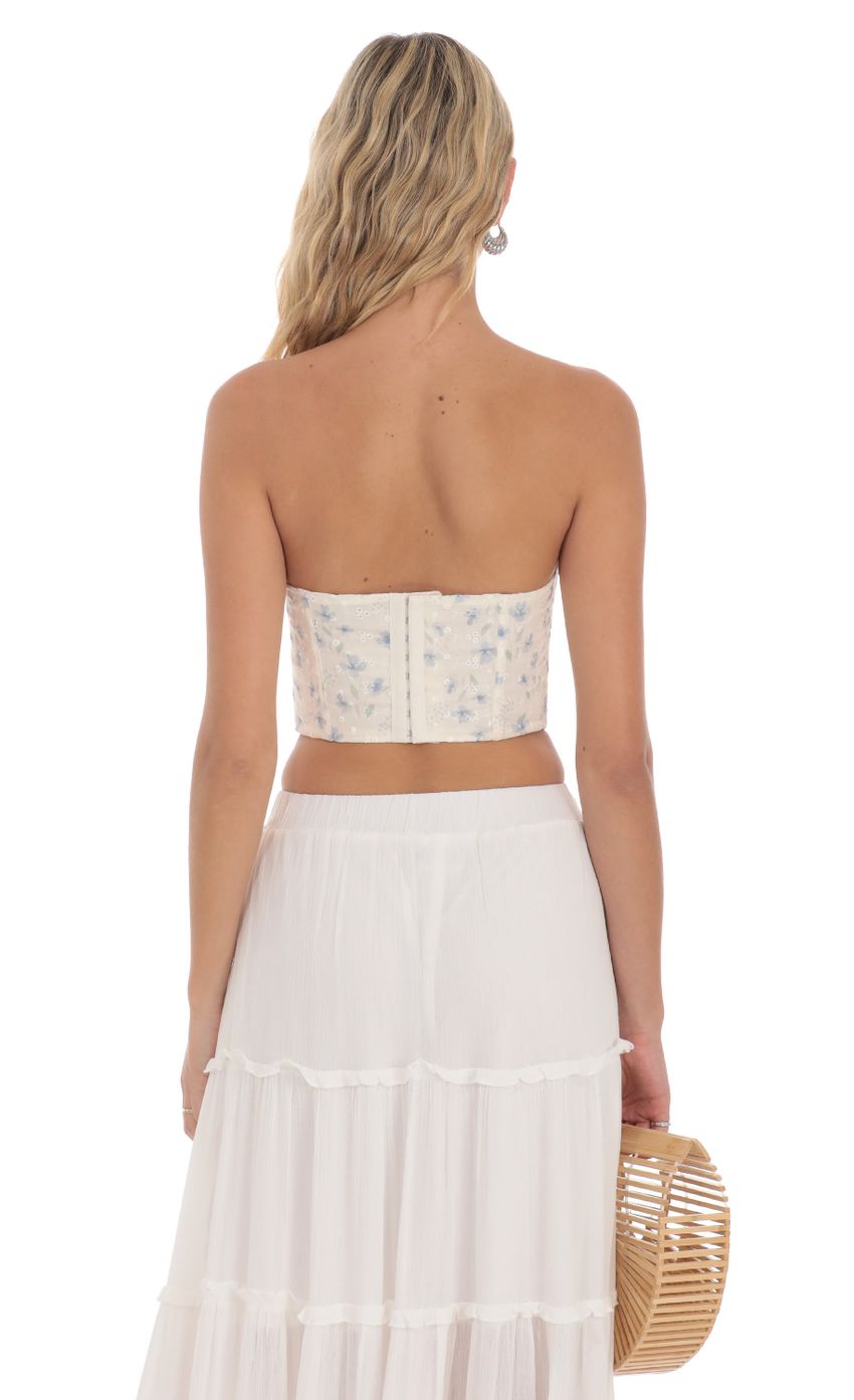 Picture Floral Strapless Corset Top in Cream. Source: https://media-img.lucyinthesky.com/data/Apr24/850xAUTO/29311794-f835-4533-ac1a-725536851f03.jpg