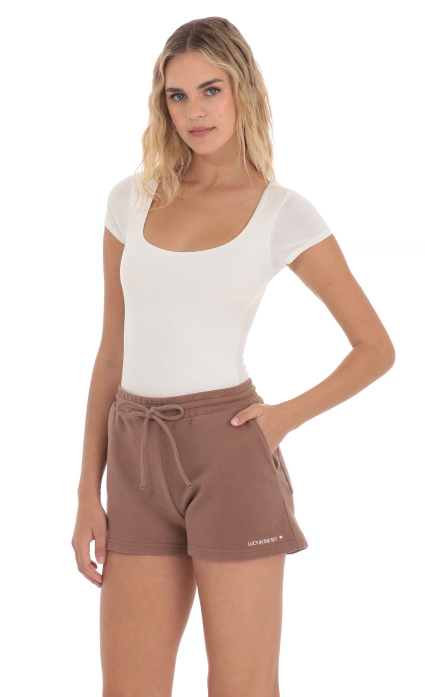 Picture Lucy in the Sky Sweat Shorts in Brown. Source: https://media-img.lucyinthesky.com/data/Apr24/850xAUTO/352d9644-ada3-4924-a6dc-3625a3c3508b.jpg