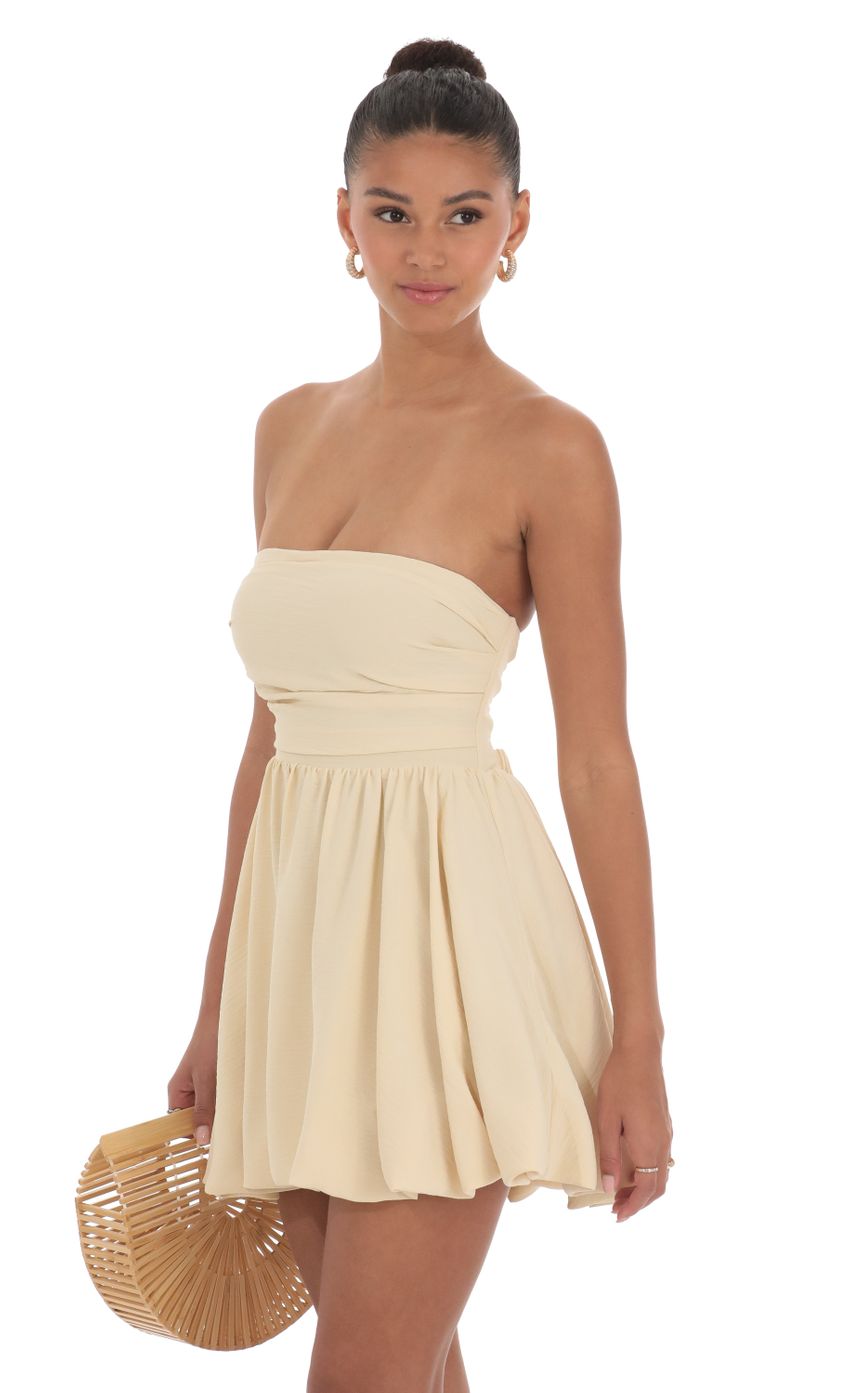 Picture Strapless Bubble Dress in Cream. Source: https://media-img.lucyinthesky.com/data/Apr24/850xAUTO/397c107d-9102-4c94-83e1-12f3f09c1a54.jpg