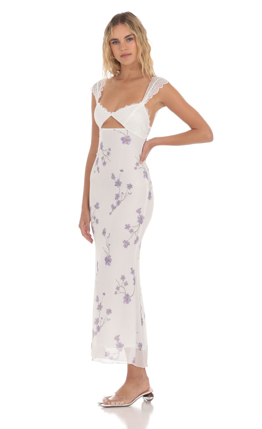 Picture Lace Cutout Floral Maxi Dress in White. Source: https://media-img.lucyinthesky.com/data/Apr24/850xAUTO/3a0e482c-b630-4ade-a29c-cef3bc47f432.jpg