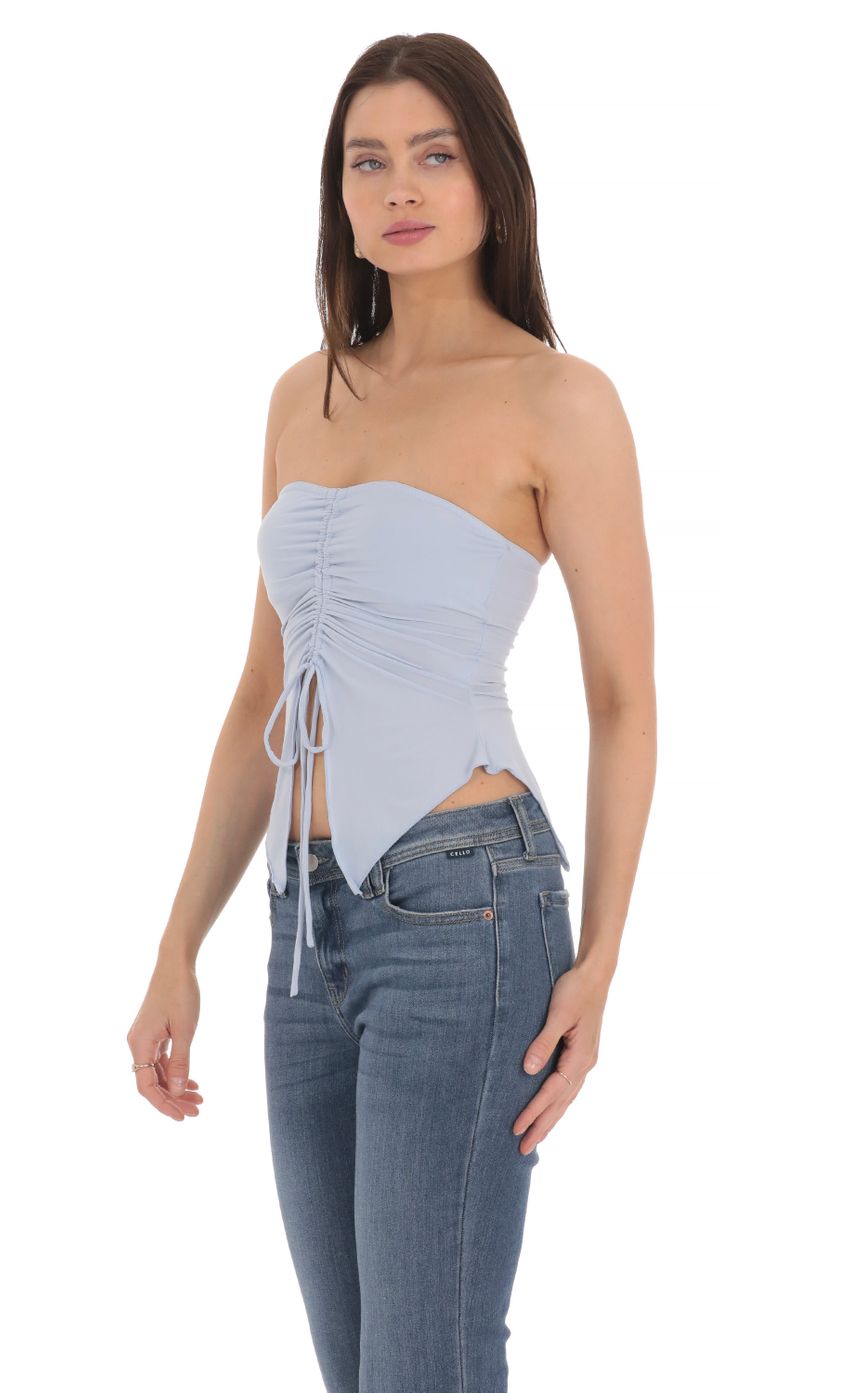 Picture Strapless Ruched Top in Powder Blue. Source: https://media-img.lucyinthesky.com/data/Apr24/850xAUTO/3e3024a0-37ba-4f7a-8a0c-a757ac2988c6.jpg