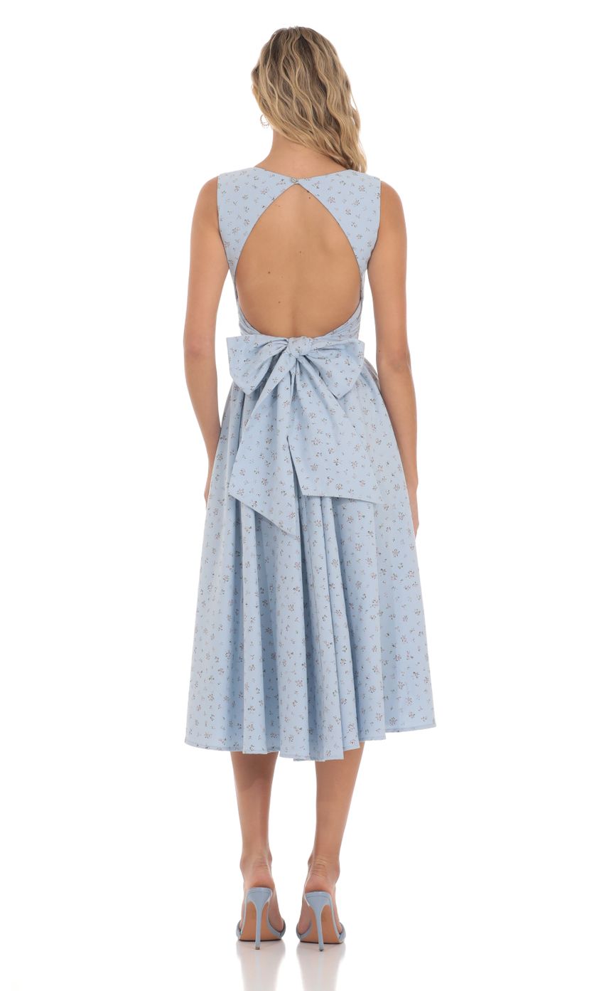 Picture Floral Open Back Midi Dress in Blue. Source: https://media-img.lucyinthesky.com/data/Apr24/850xAUTO/4420a8e8-a50b-45d8-833d-08dd54f35eeb.jpg
