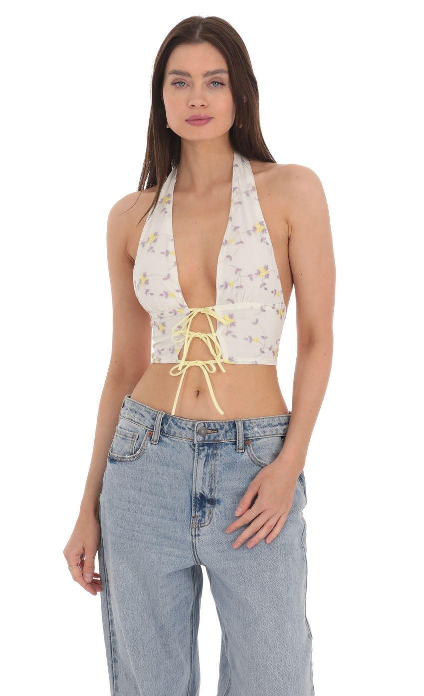 Picture Floral Halter Top in White. Source: https://media-img.lucyinthesky.com/data/Apr24/850xAUTO/46546737-0ddb-4977-a37e-354630849076.jpg