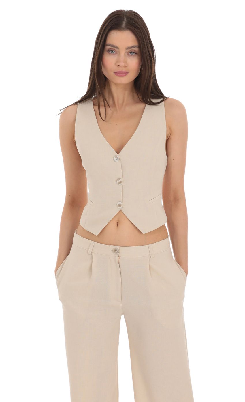Picture Linen Buttoned Vest in Cream. Source: https://media-img.lucyinthesky.com/data/Apr24/850xAUTO/48561f27-b94a-4ade-a58a-c9f4237f7b23.jpg