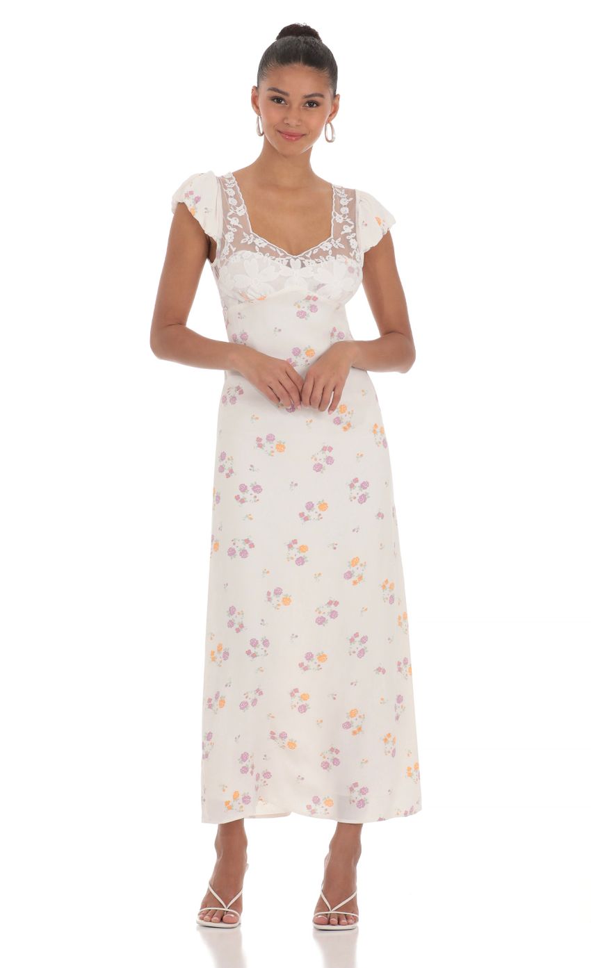 Picture Puff Sleeve Floral Maxi Dress in White. Source: https://media-img.lucyinthesky.com/data/Apr24/850xAUTO/4ada6613-435c-4fd3-8b45-4f97d9548a99.jpg