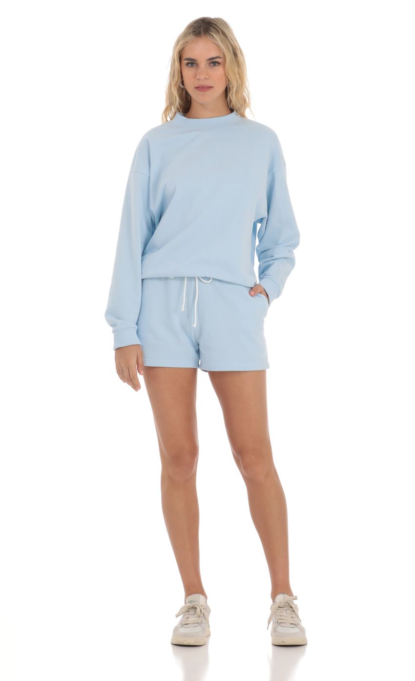 Picture Sweat Shorts in Baby Blue. Source: https://media-img.lucyinthesky.com/data/Apr24/850xAUTO/4d6d0564-bcf0-4a6d-b621-67281a597d3d.jpg