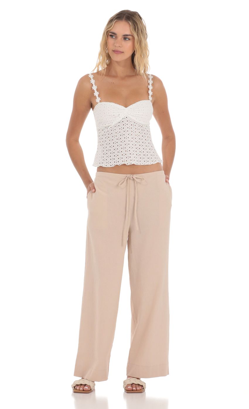 Picture Low Rise Straight Pants in Light Brown. Source: https://media-img.lucyinthesky.com/data/Apr24/850xAUTO/54d86d4f-92ff-4110-8be0-f7ace301f39f.jpg